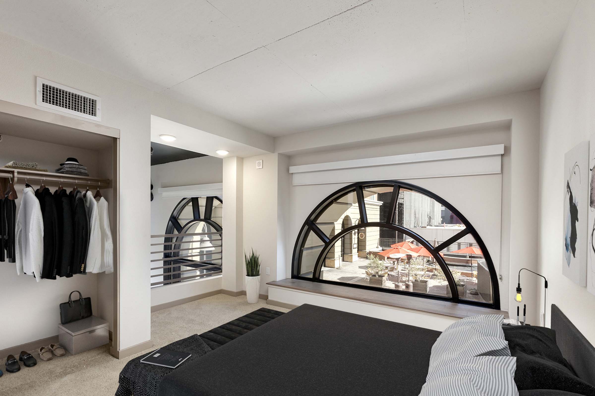 21-Camden-Harbor-View-Apartments-Long-Beach-ca-loft-style-living-space-with-arched-window-in-live-work-home.jpg_1